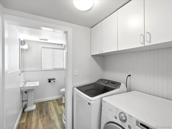 a bedroom with bed and a window