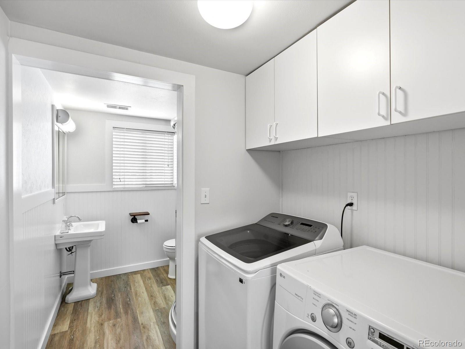 7750 East Greenland Road Franktown, CO 80116 - Photo 28 of 48 a utility room with dryer and washer