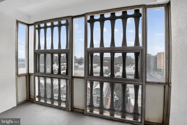 a view of a hallway with staircase