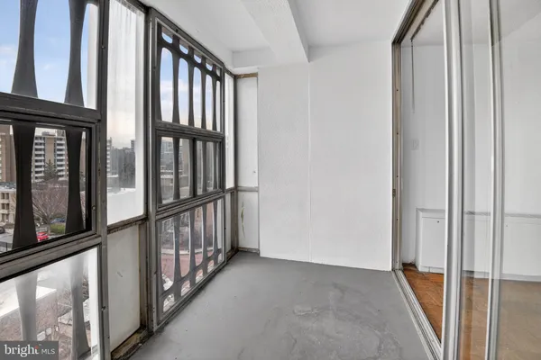 a view of small space with racks on the wall