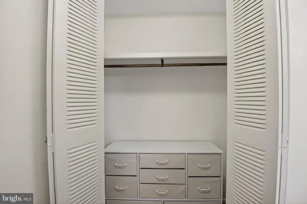 a bathroom with a sink and shower