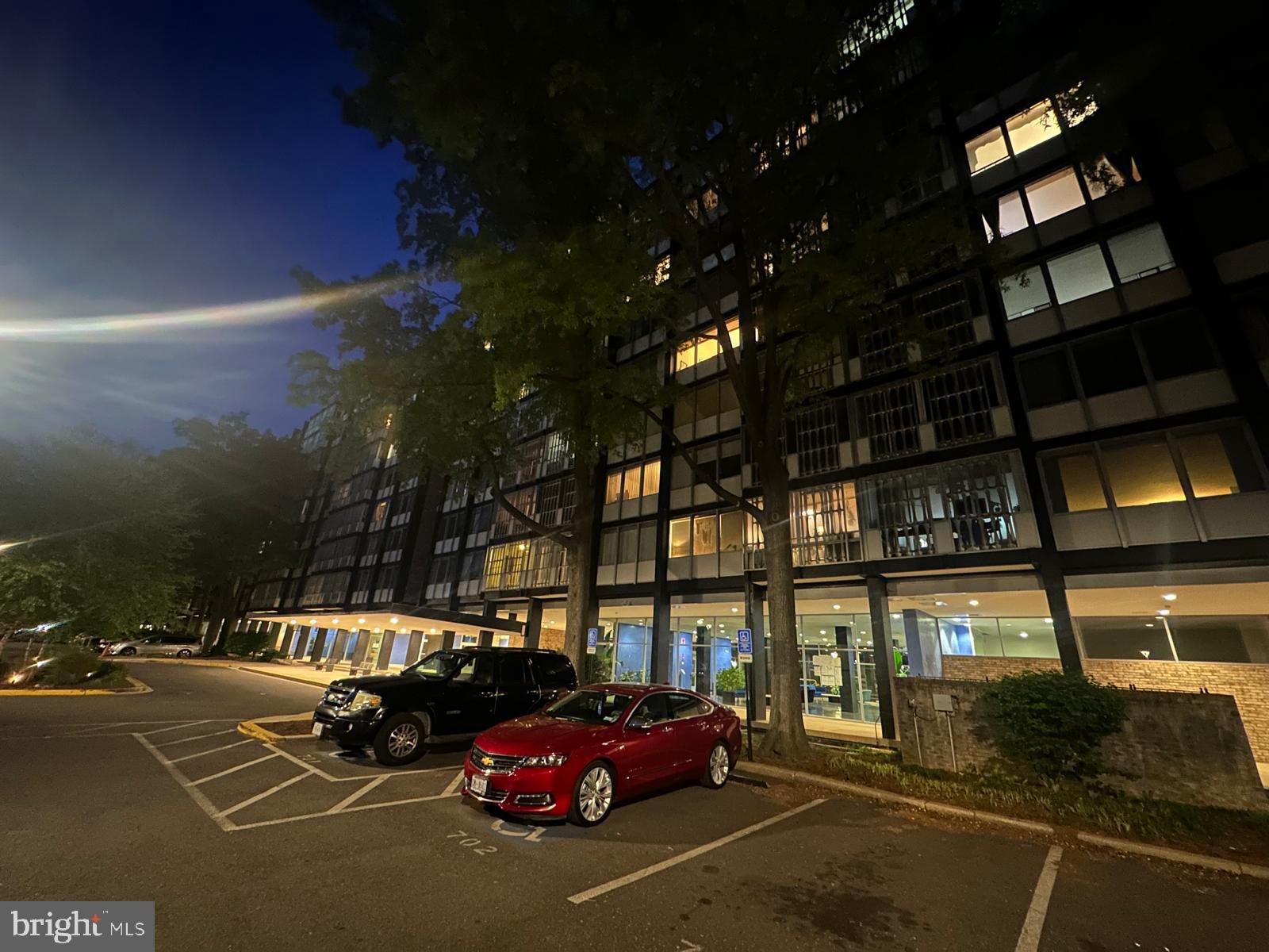 1301 Delaware Avenue Southwest, Unit N602 Washington, DC 20024 - Photo 2 of 22 a view of a building with car parked