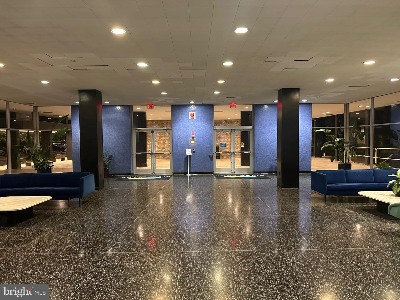 1301 Delaware Avenue Southwest, Unit N602 Washington, DC 20024 - Photo 5 of 22 a view of a lobby with a couch and a rug