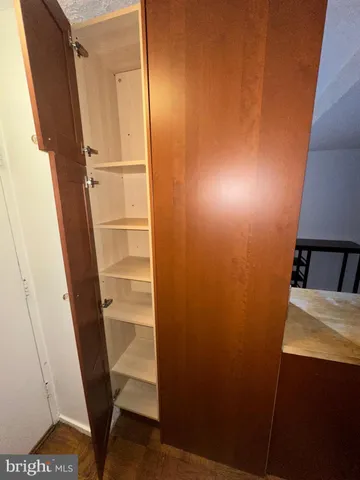 a view of a hallway with an empty room