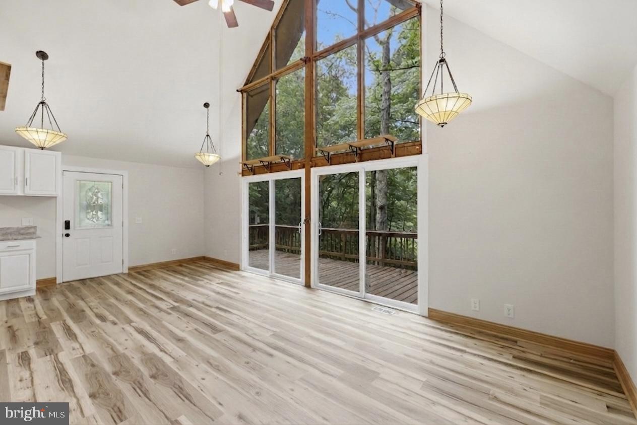 11492 Rawhide Road Lusby, MD 20657 - Photo 2 of 20 Bright, airy space with nature views.