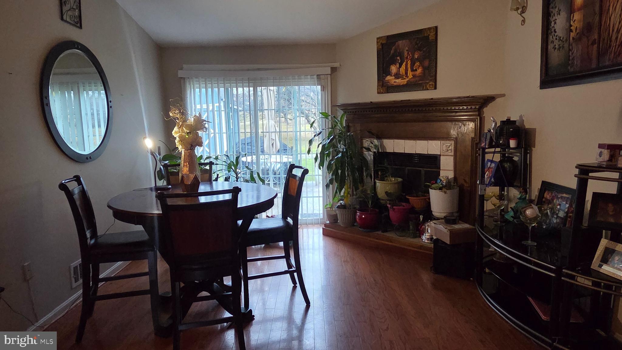 9104 Trumps Hill Road Upper Marlboro, MD 20772 - Photo 5 of 11 a dining room with furniture window and wooden floor