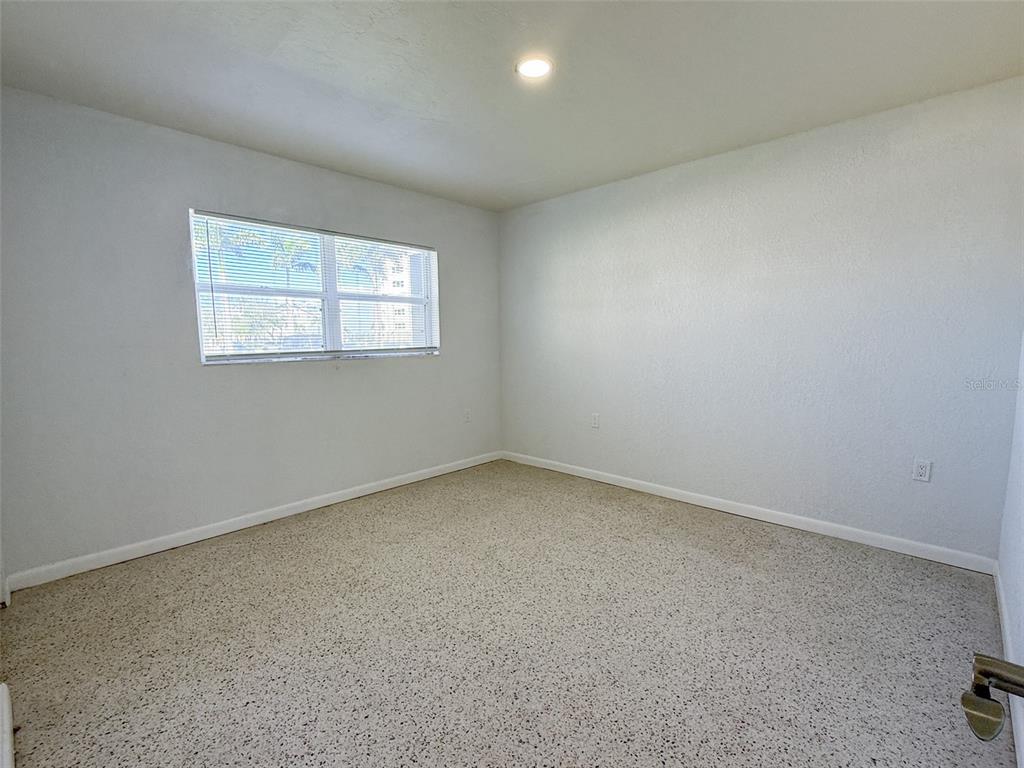 111 177th Avenue West, Unit 3 Redington Shores, FL 33708 - Photo 11 of 16 an empty room with a window