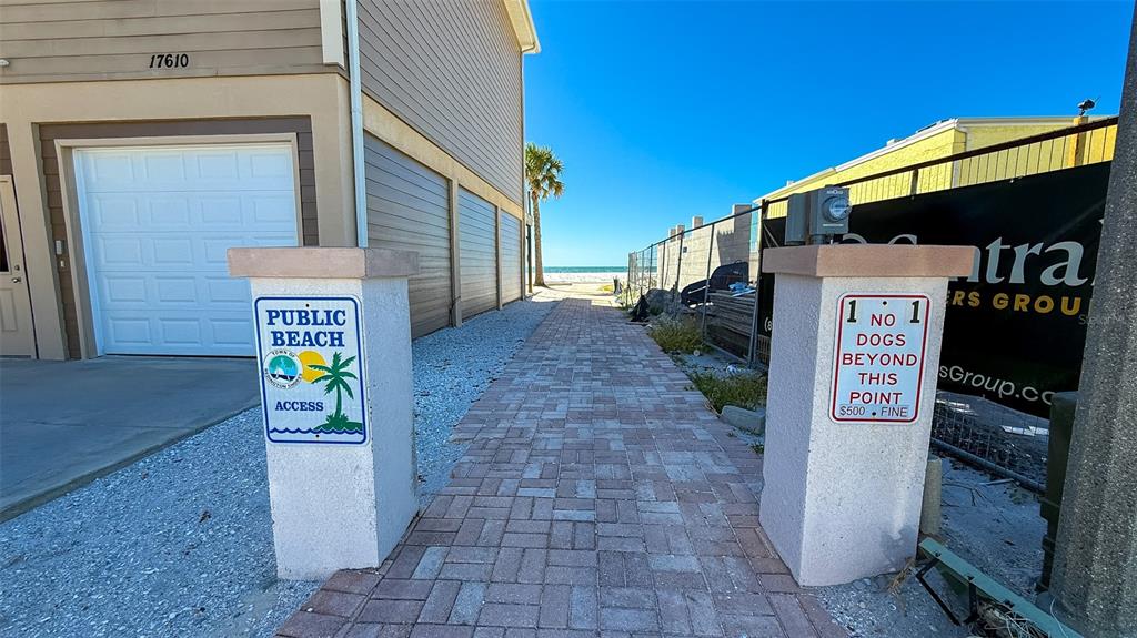 111 177th Avenue West, Unit 3 Redington Shores, FL 33708 - Photo 14 of 16 a sign board on the wall