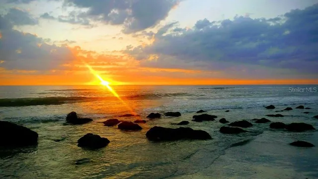 a view of a lake and mountain