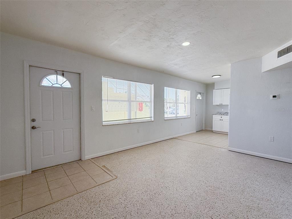 111 177th Avenue West, Unit 3 Redington Shores, FL 33708 - Photo 3 of 16 an empty room with windows