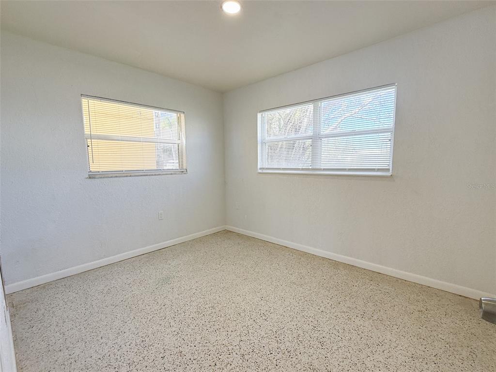 111 177th Avenue West, Unit 3 Redington Shores, FL 33708 - Photo 9 of 16 an empty room with a window