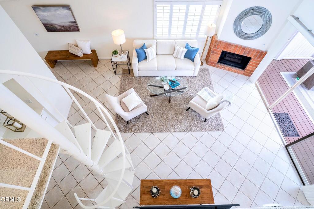 4625 Falkirk Bay Oxnard, CA 93035 - Photo 25 of 37 a living room with furniture and a table