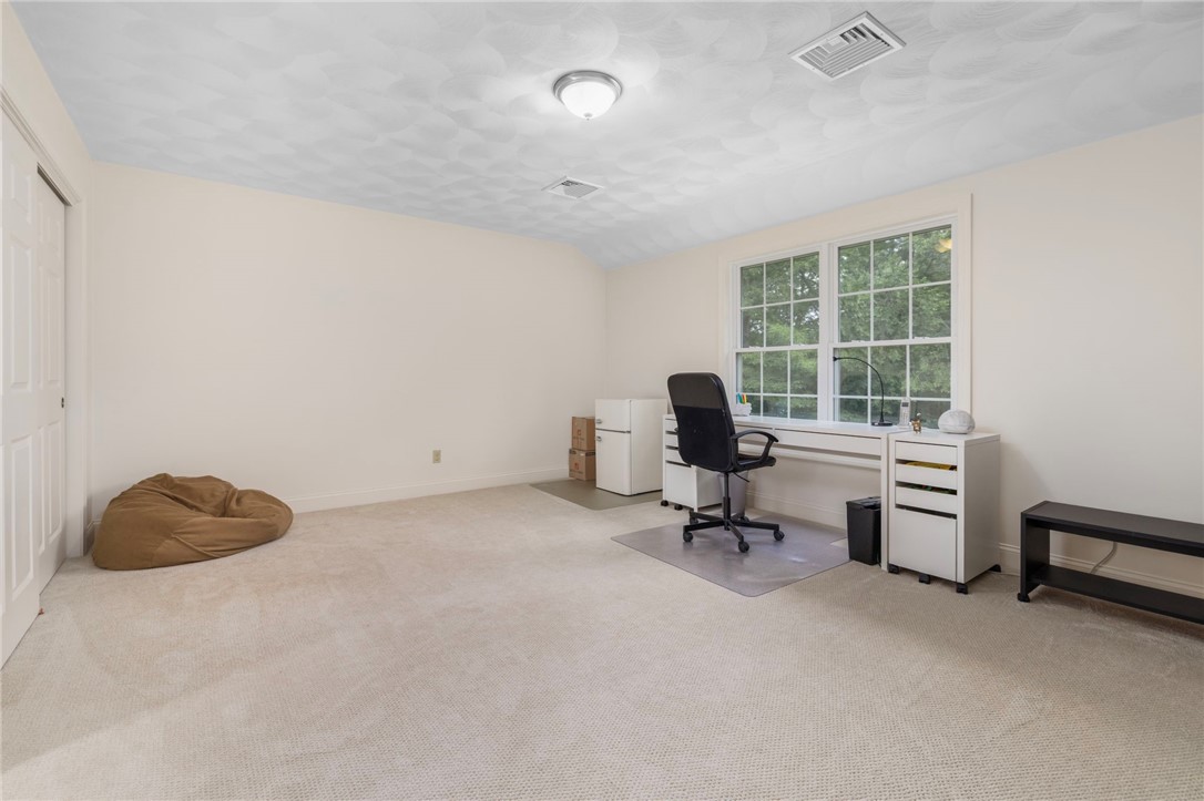 321 River Road Lincoln, RI 02865 - Photo 28 of 45 The expansive, fourth bedroom is a blank slate for multiple uses.