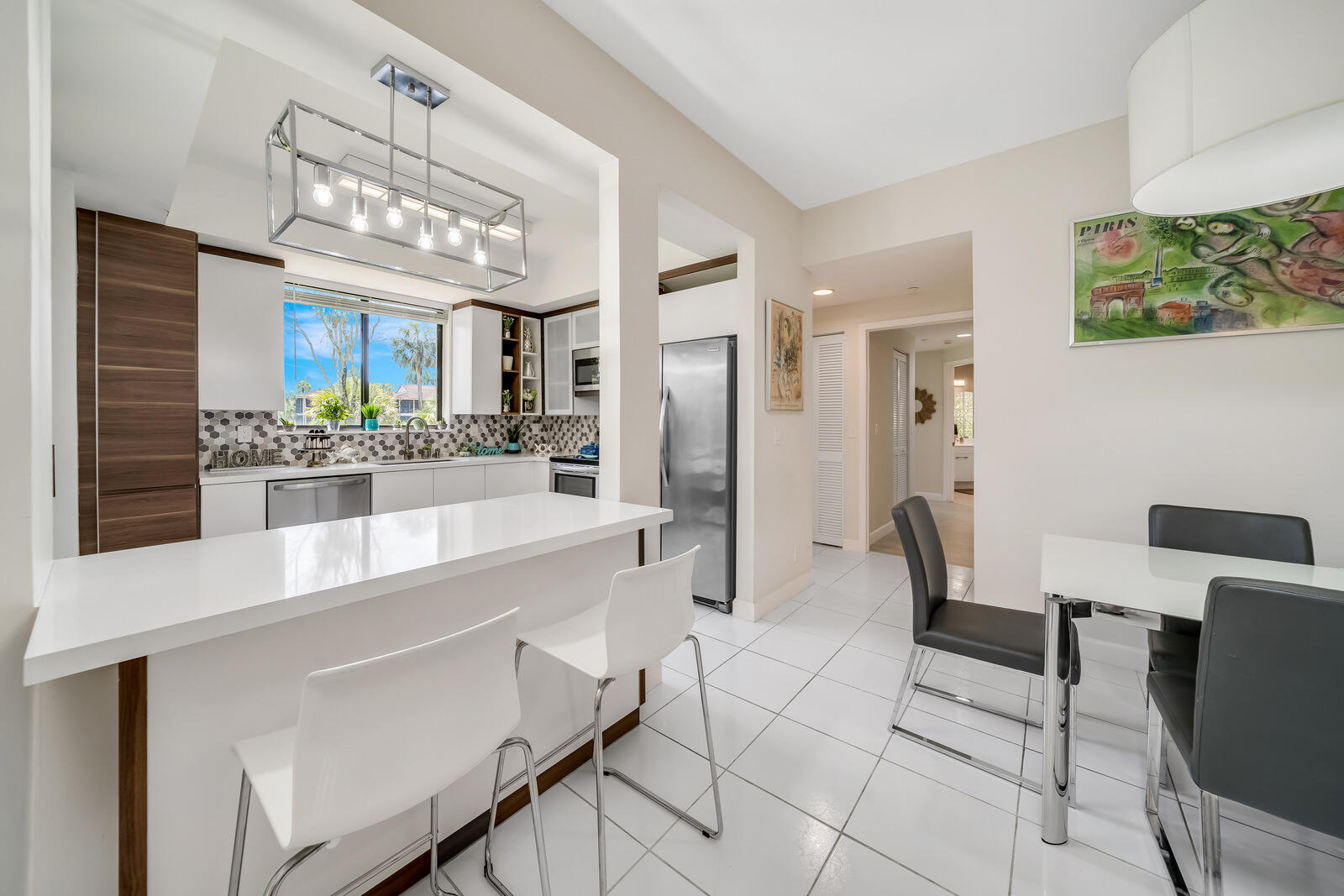 7546 La Paz Boulevard, Unit 106 Boca Raton, FL 33433 - Photo 11 of 66 bright kitchen
