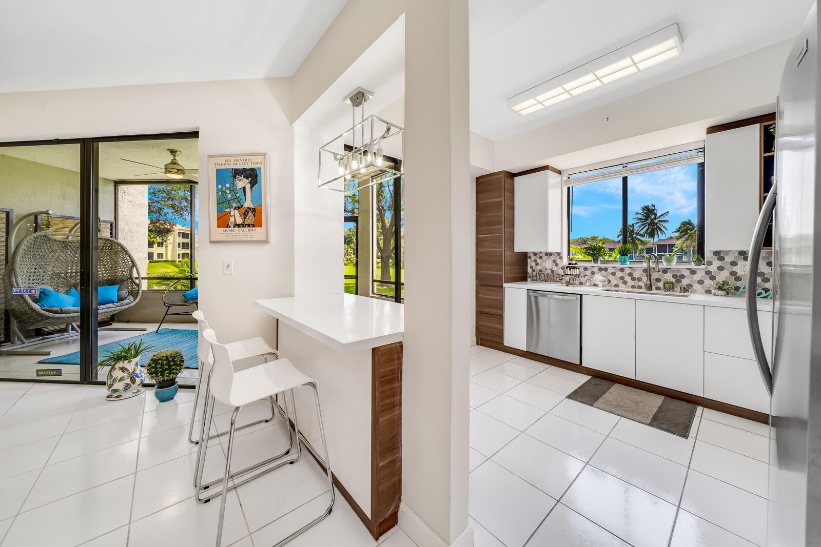 7546 La Paz Boulevard, Unit 106 Boca Raton, FL 33433 - Photo 12 of 66 tall/high ceilings and windows