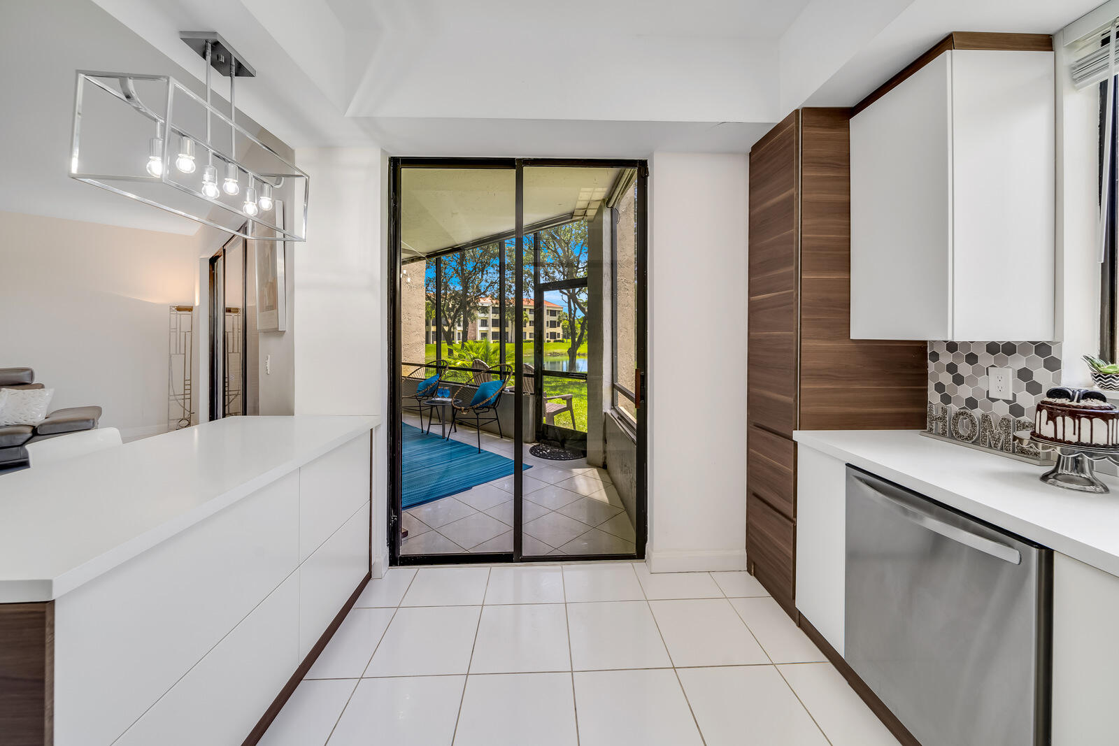 7546 La Paz Boulevard, Unit 106 Boca Raton, FL 33433 - Photo 17 of 66 patio from kitchen
