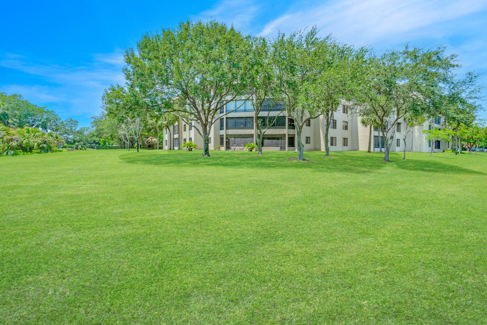 7546 La Paz Boulevard, Unit 106 Boca Raton, FL 33433 - Photo 46 of 66 REAR PIC OF BUILDING
