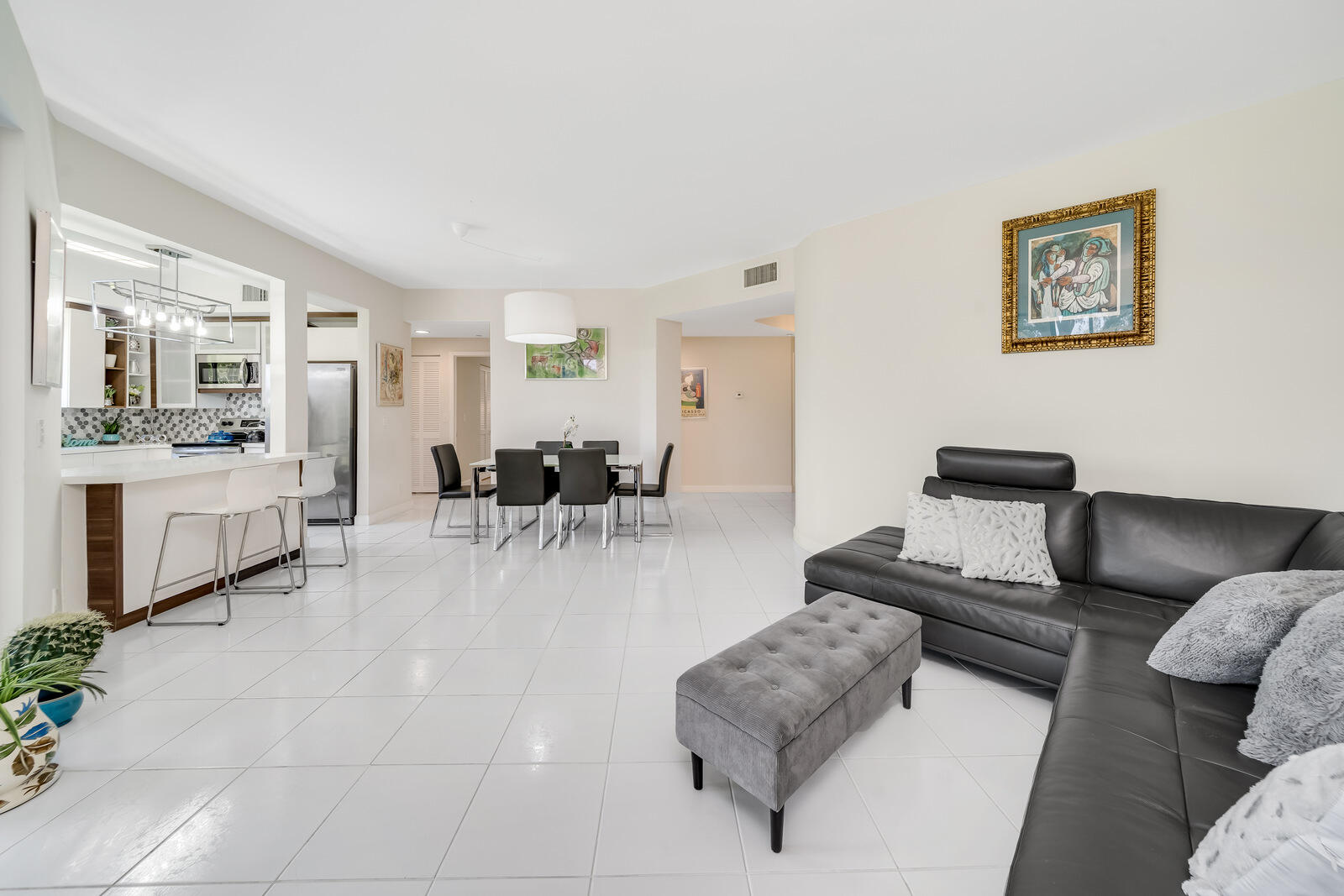 7546 La Paz Boulevard, Unit 106 Boca Raton, FL 33433 - Photo 5 of 66 living/dining/snack bar