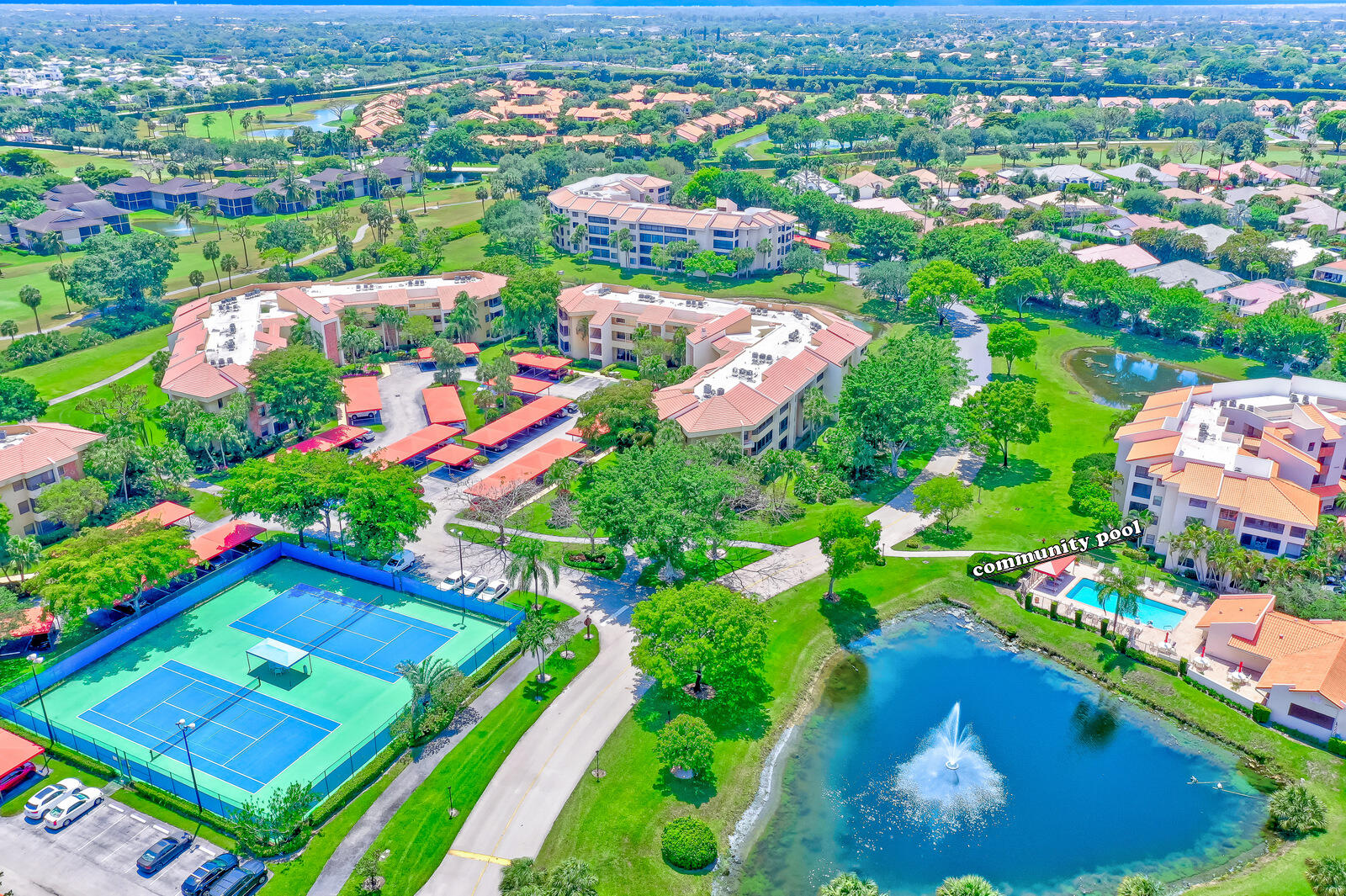 7546 La Paz Boulevard, Unit 106 Boca Raton, FL 33433 - Photo 55 of 66 AERIAL OF COMMUNITY TENNIS