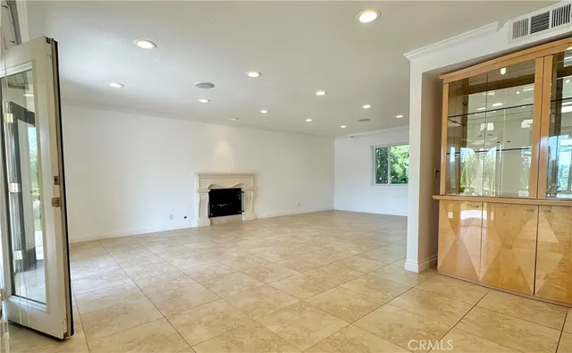 an empty room with wooden door
