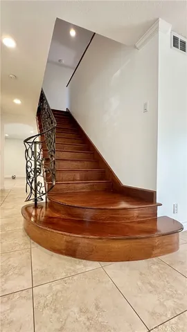 a view of a room with rack and wooden floor