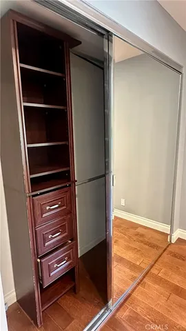 a view of a garden with lawn chairs