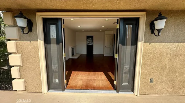 a room with furniture and flat screen tv