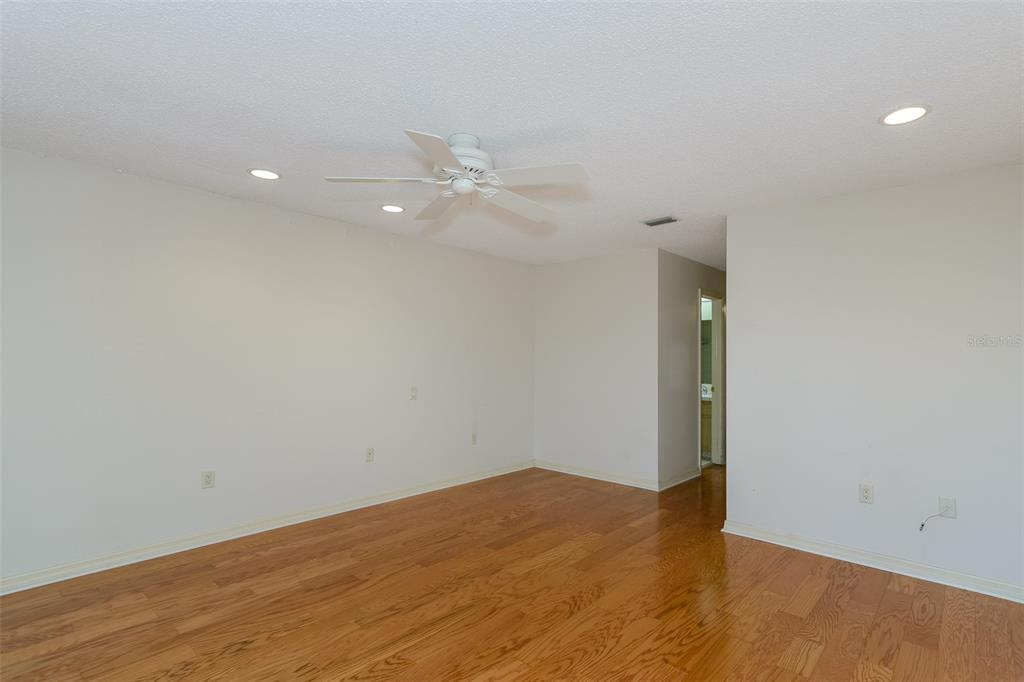 2101 Sunset Point Road, Unit 1003 Clearwater, FL 33765 - Photo 21 of 39 Primary Bedroom