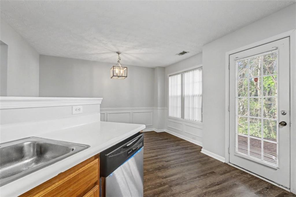 4612 Grand Central Parkway Decatur, GA 30035 - Photo 5 of 10 a kitchen that has a sink and a stove