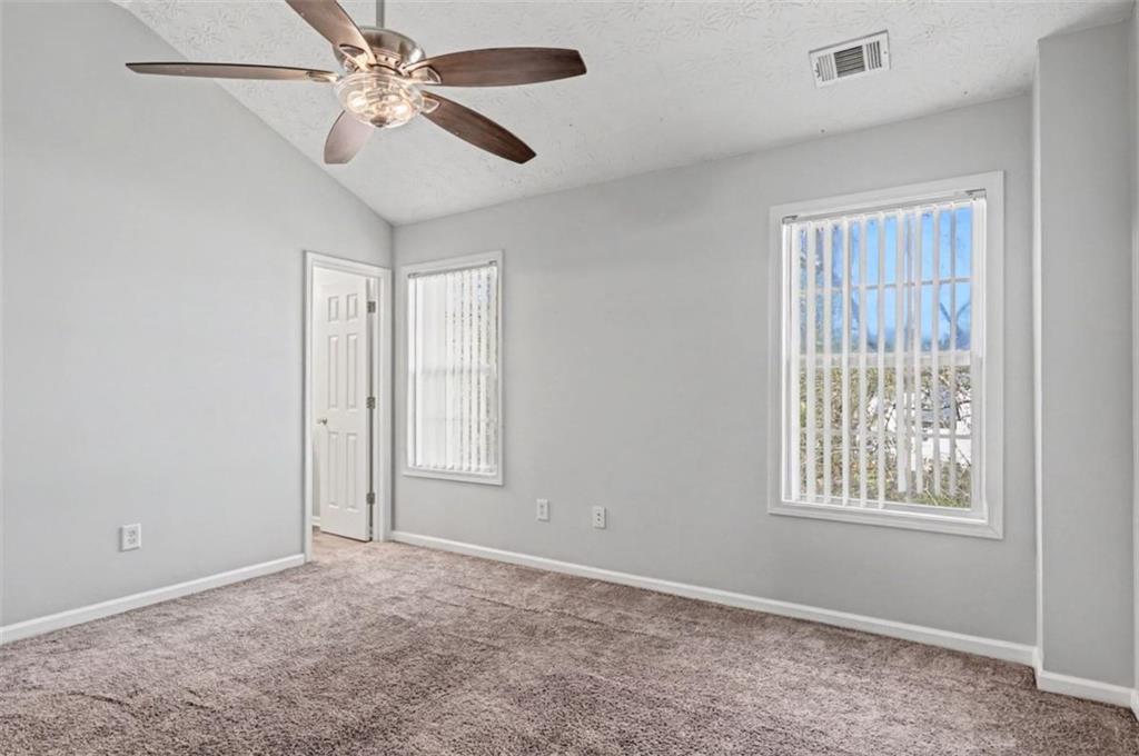 4612 Grand Central Parkway Decatur, GA 30035 - Photo 8 of 10 a view of an empty room with a window