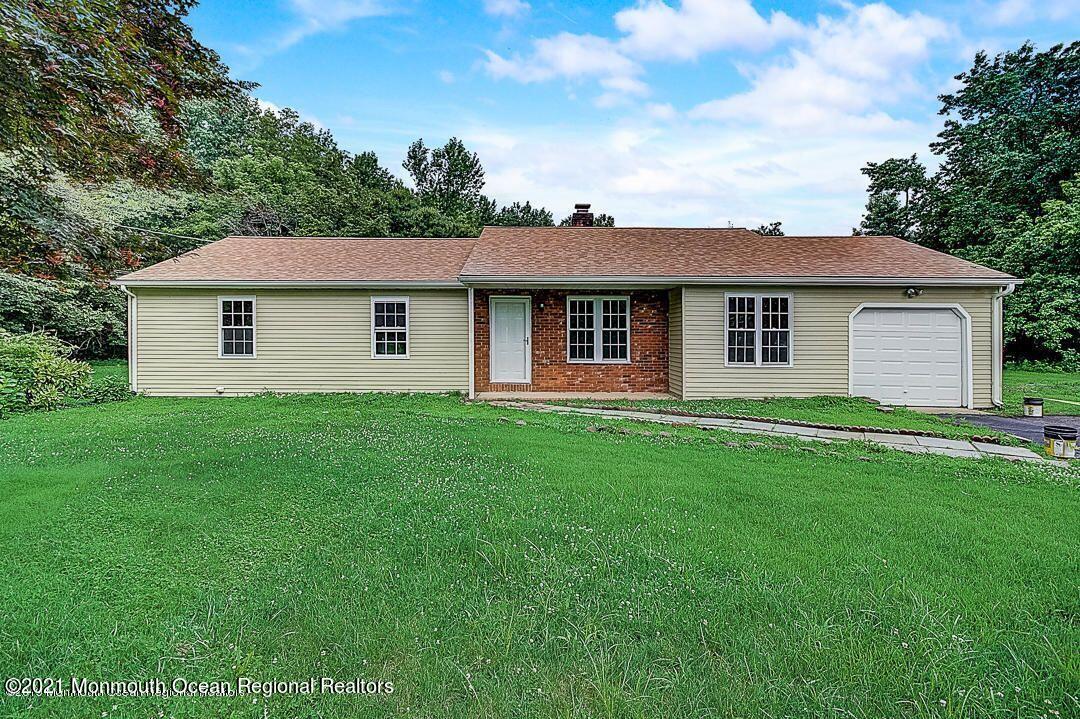 914 Monmouth Road Cream Ridge, NJ 08514 - Photo 1 of 17 a view of a house with a backyard