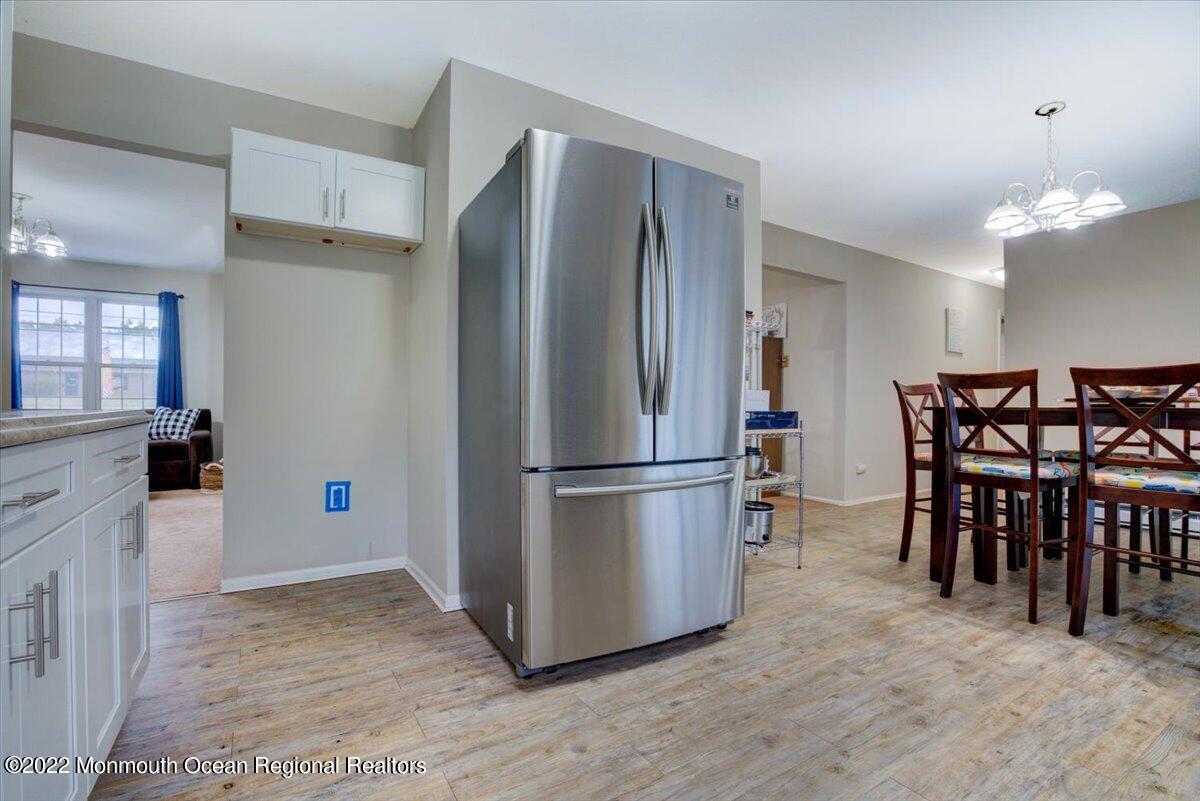 914 Monmouth Road Cream Ridge, NJ 08514 - Photo 11 of 17 a kitchen with stainless steel appliances granite countertop a refrigerator and a stove top oven