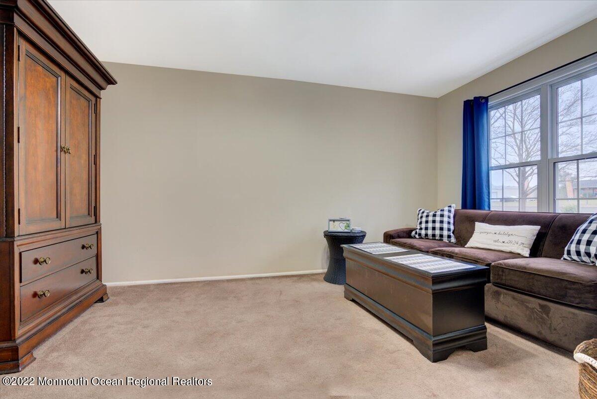 914 Monmouth Road Cream Ridge, NJ 08514 - Photo 13 of 17 a living room with furniture and a window