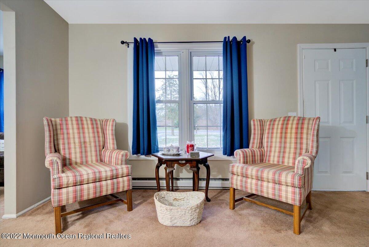 914 Monmouth Road Cream Ridge, NJ 08514 - Photo 16 of 17 a living room with furniture and a large window