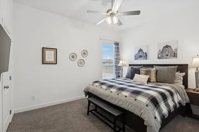 a hallway with a washer and dryer