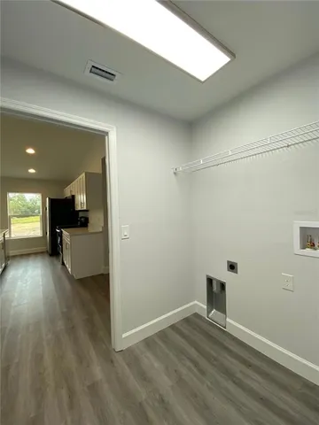 a view of kitchen and utility room