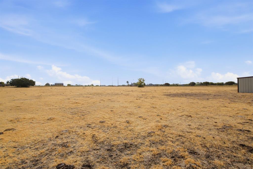 950 Johnson Bend Road Weatherford, TX 76088 - Photo 37 of 40 Expansive open lot with a large metal utility building