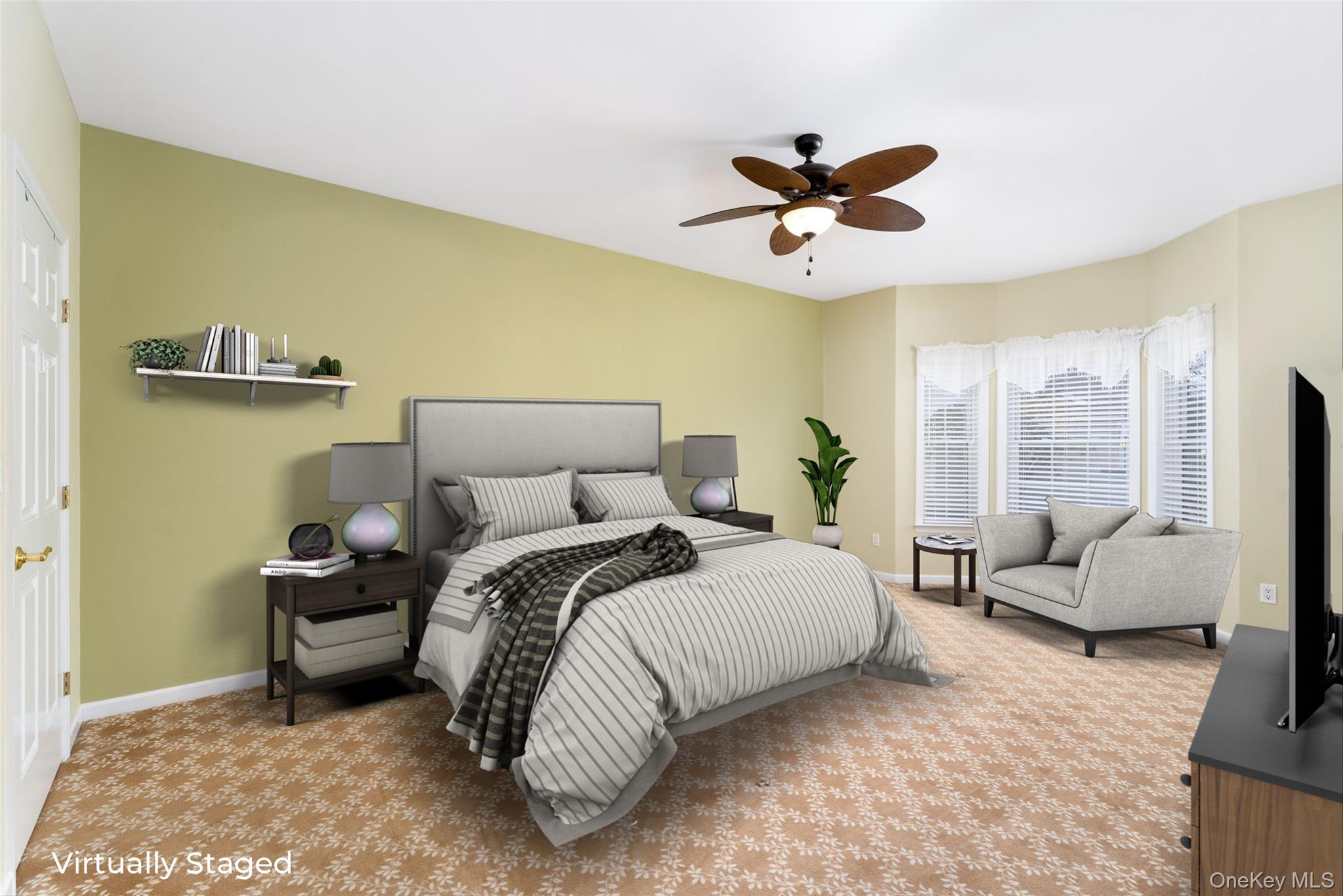 230 Ira Road, Unit 230 Mount Sinai, NY 11766 - Photo 14 of 38 a bedroom with a bed and ceiling fan