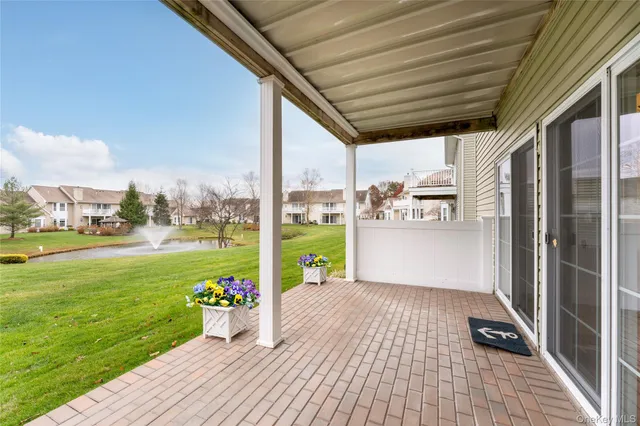 an aerial view of residential house with outdoor space and swimming pool