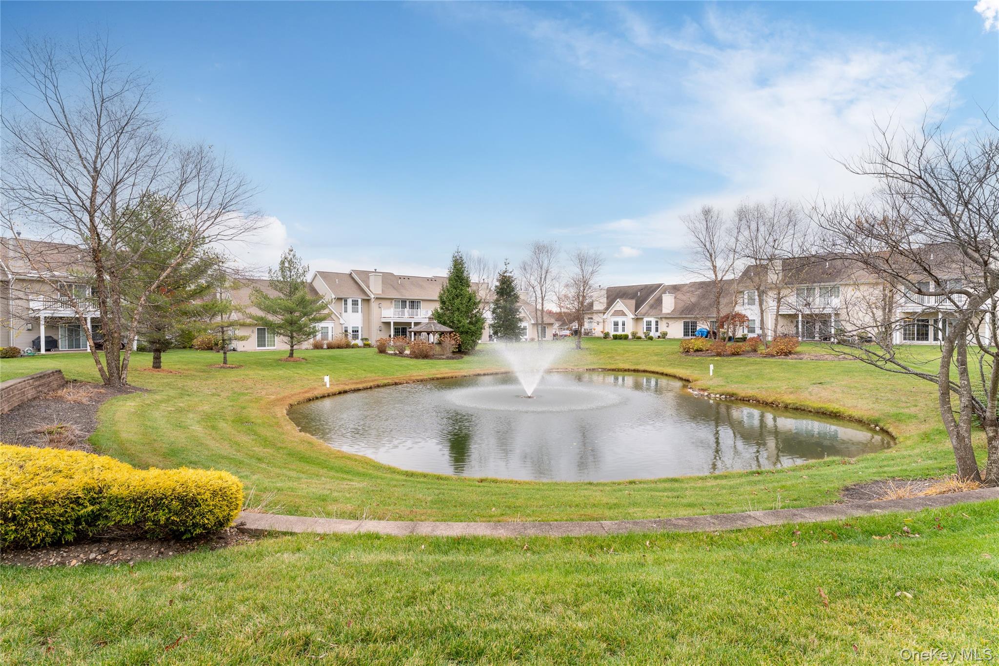 230 Ira Road, Unit 230 Mount Sinai, NY 11766 - Photo 25 of 38 a view of a swimming pool with a yard