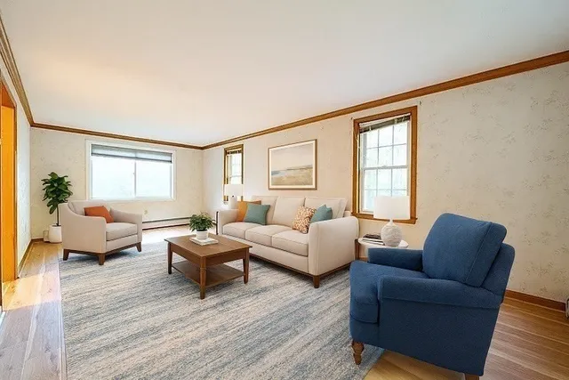 a bedroom with a bed and potted plant