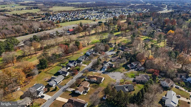 an aerial view of a city with lots of residential buildings
