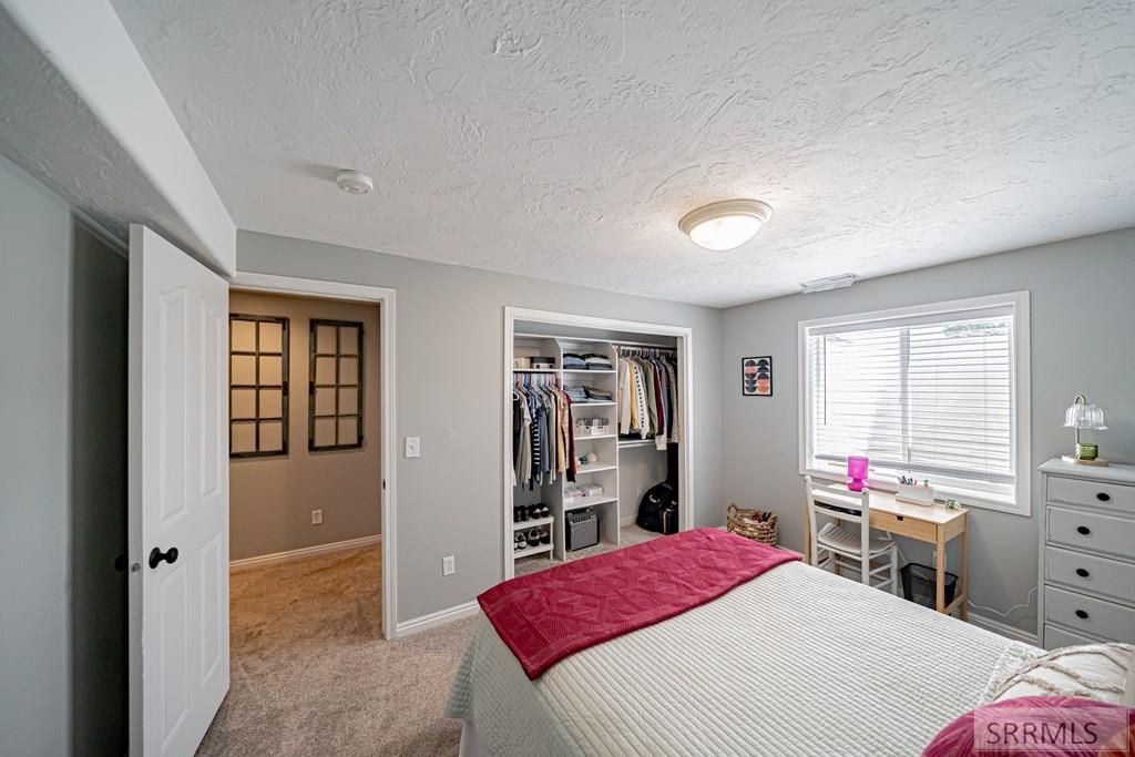 3947 Jordan Circle Ammon, ID 83406 - Photo 66 of 81 Basement Bedroom 1
