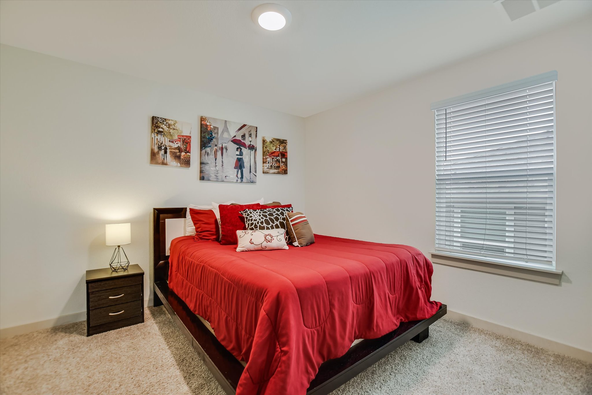 105 Merrick Road Georgetown, TX 78628 - Photo 15 of 23 A well-lit bedroom provides comfortable repose with soft carpet and a window offering natural light.