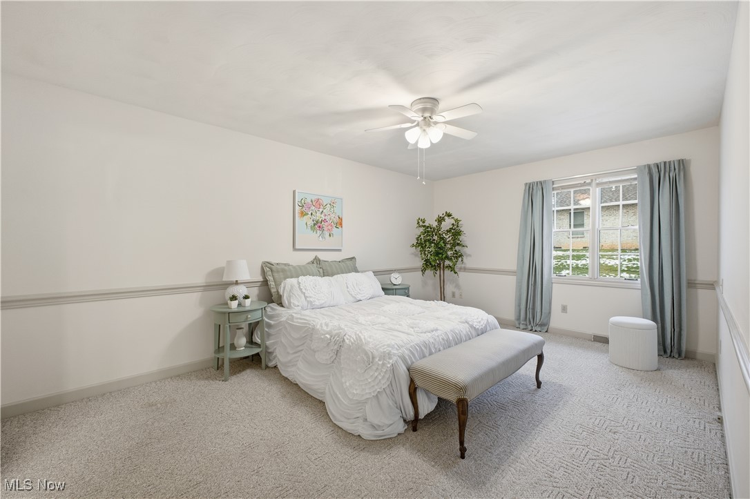 197 Mathews Road, Unit B Youngstown, OH 44512 - Photo 15 of 37 Bedroom with a ceiling fan and light colored carpet