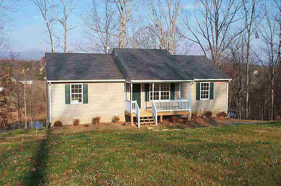 Petunia Road, Unit K26 Ruckersville, VA 22968 - Photo 1 of 1 a backyard of a house with yard table and chairs