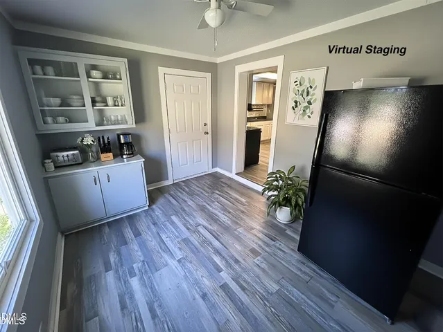 a view of a room with large trees