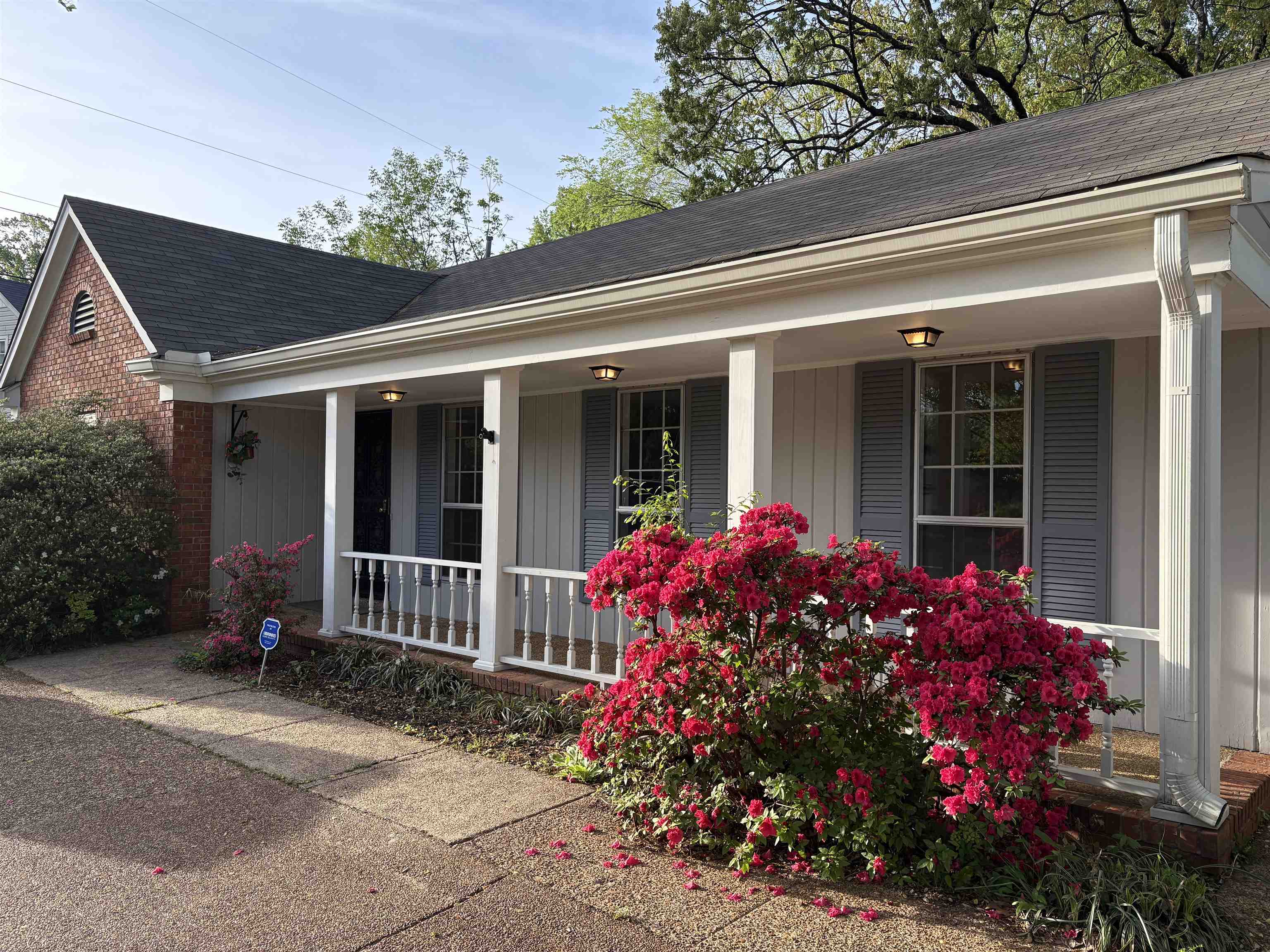 5459 Knight Arnold Road Memphis, TN 38115 - Photo 3 of 38 View of home's exterior with roof with shingles and a porch