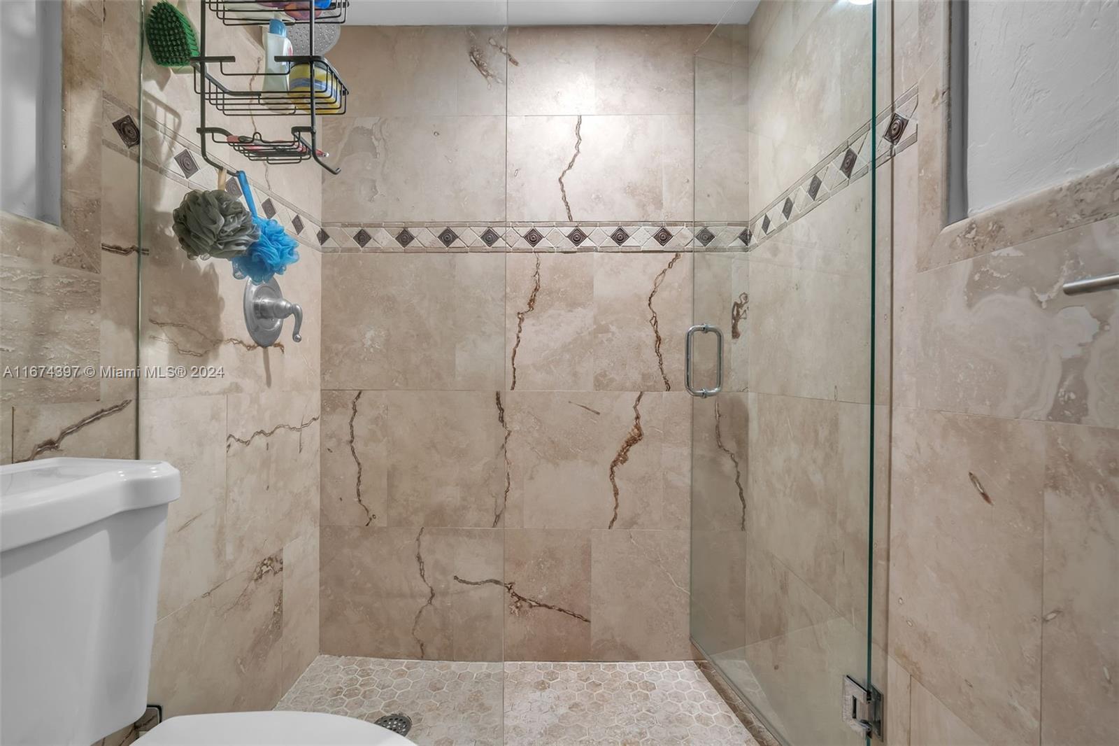 8335 Southwest 72nd Avenue, Unit 312D Miami, FL 33143 - Photo 12 of 45 a bathroom with a shower