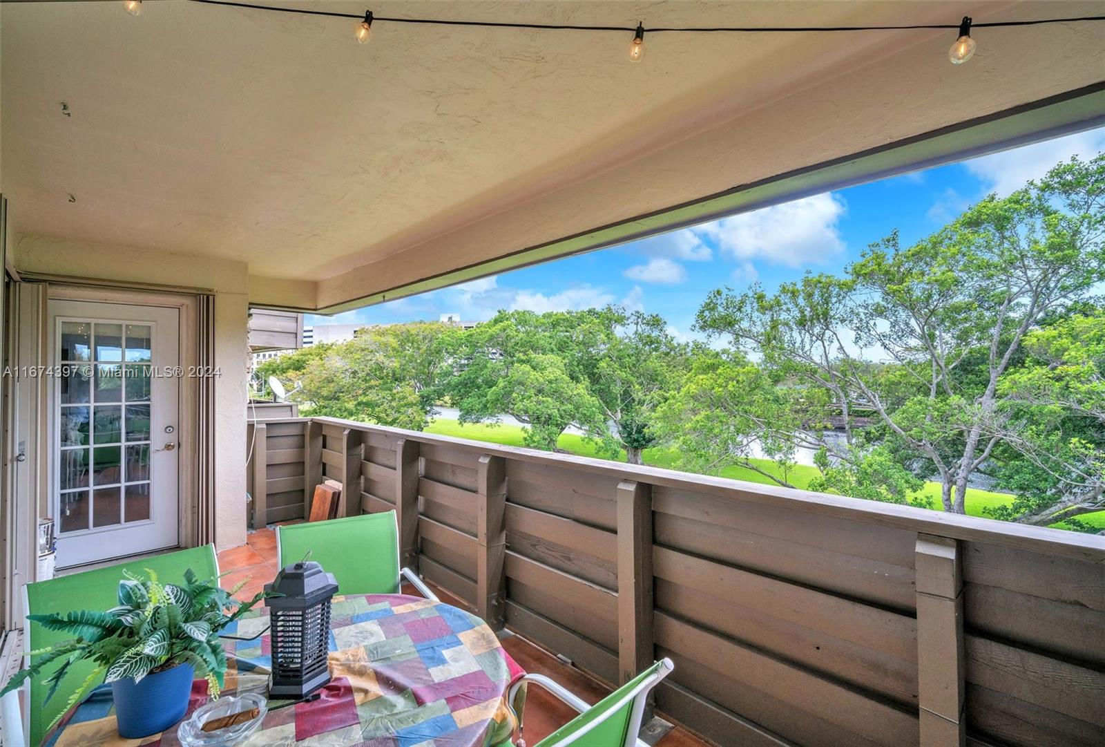 8335 Southwest 72nd Avenue, Unit 312D Miami, FL 33143 - Photo 25 of 45 a view of balcony with furniture
